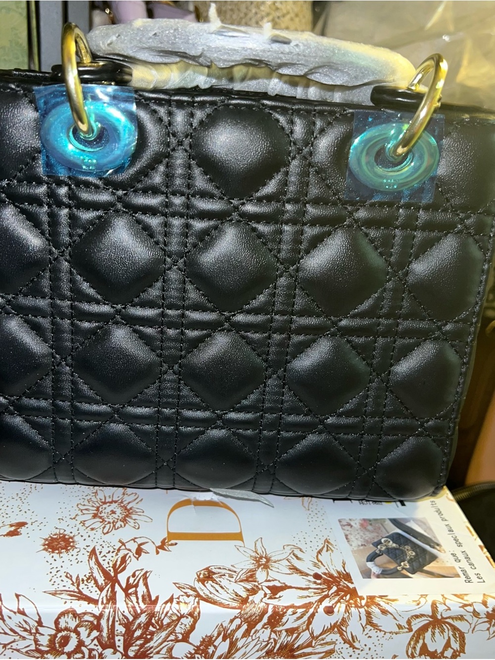 Stylish Black Quilted Crossbody Bag with Gold Accents